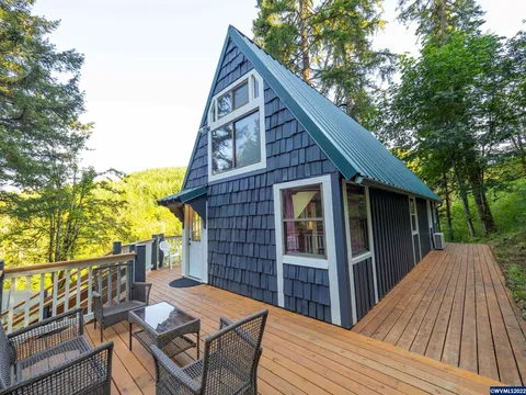 A-frame cabin deck and siding