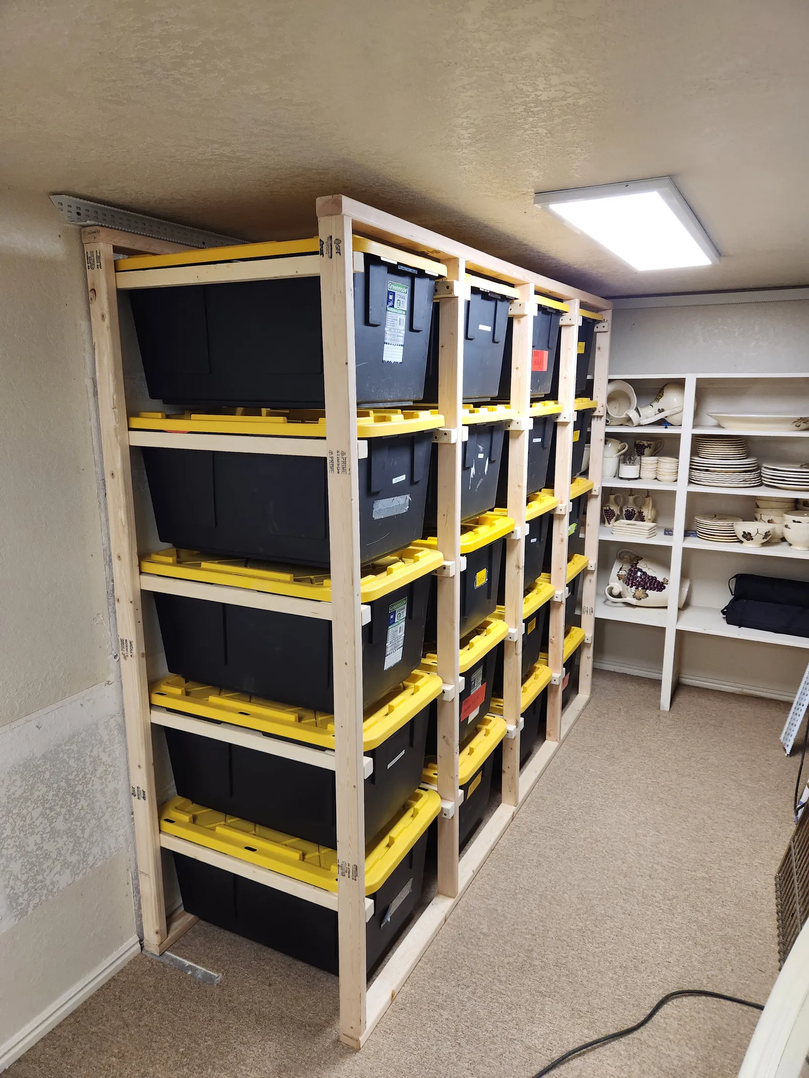 Built-in basement storage shelving for bins